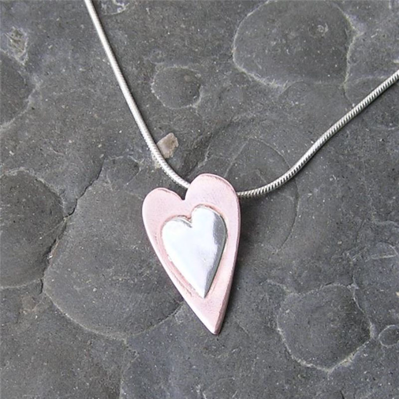 Order Silver and copper heart pendant
